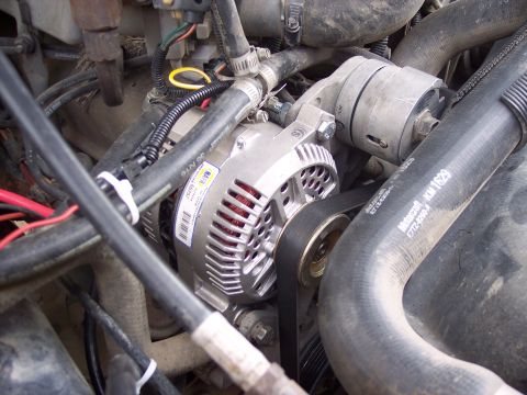 1988 Ford Bronco - Mounted, had to slightly modify the original bracket. Alt and batt. are grounded to the same location on the frame.