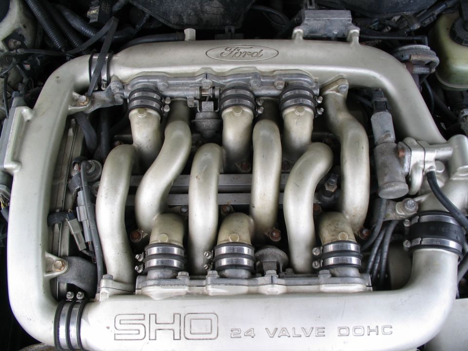 Ford SHO 24 valve engine intake manifold with visible "SHO" and "24 VALVE" text