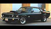 2000 Ford Mustang - A black 1969 Ford Mustang Mach 1 is shown from a three-quarter front view.