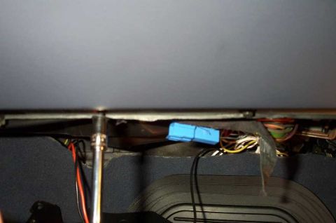 1998 Ford Crown Victoria - To gain more access, I removed the glove box by removing it's three screws. Pictures here, is a socket with an extension, removing the blac…