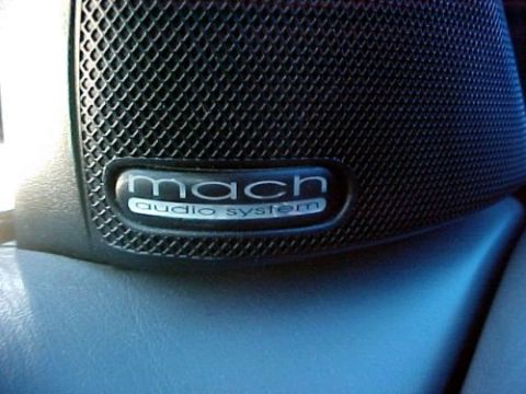 1997 Ford Expedition - Close-up of a Mach audio system speaker grille, part of a vehicle's interior.