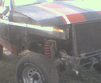 1983 Ford Bronco - This 1983 Ford Bronco shows damage to its front end, with visible red suspension springs.