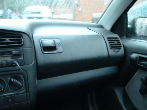 1994 Volkswagen Jetta - Interior view of a 1994 Volkswagen Jetta dashboard, showing the glove box and air vents.