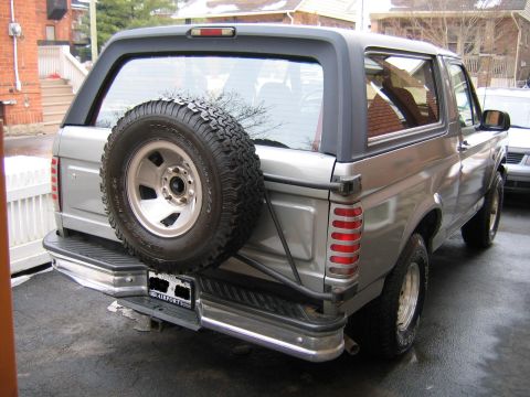 1992 Ford Bronco - re-painted spare, tail light covers