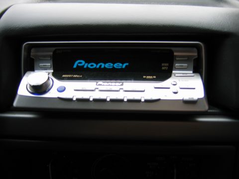 1992 Ford Bronco - Close-up of a Pioneer car stereo system, showing the display and control buttons.