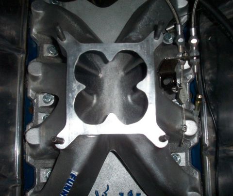 1994 Ford F-150 - Picture of the unique cloverleaf design of the phlenum on the Funnelweb. It acts like a tapered 4 hole spacer and increases velocity thru t…