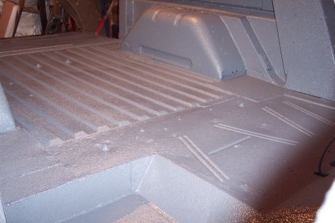 1974 Ford Bronco - The cargo area of a 1974 Ford Bronco has been coated with a gray spray-on bedliner.