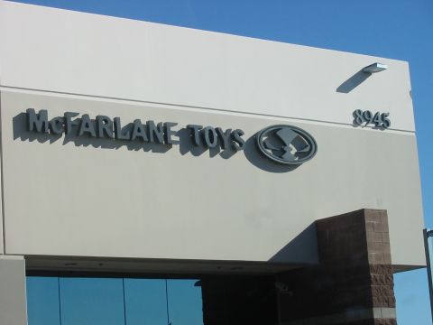 1991 Ford Bronco - The exterior of a building displays the McFarlane Toys logo and the address 8945.
