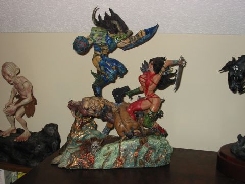 1991 Ford Bronco - Collection of fantasy action figures depicting a battle scene.