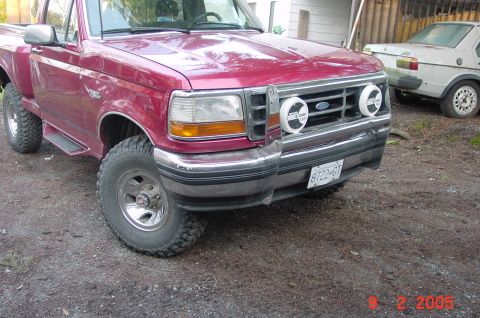 1992 Ford F-150 - This 1992 Ford F-150 pickup truck is shown from the front 3/4 angle, auxiliary lights and a visible license plate.