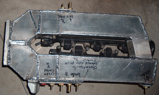 Custom aluminum intake manifold with engine coils and solenoids, labeled for cruise control, brake, charcoal canister, and PCV