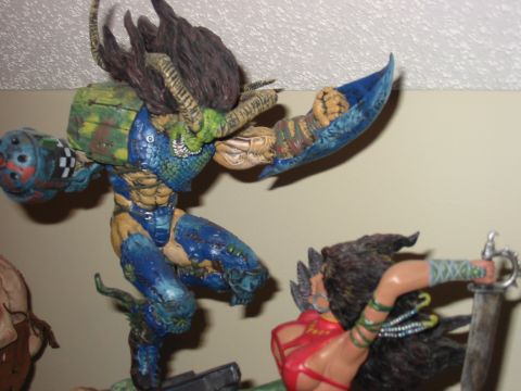 1991 Ford Bronco - A close-up of two intricately painted action figures engaged in a dramatic pose.