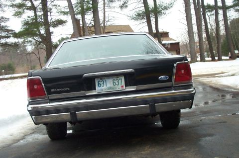 1991 Ford Crown Victoria LTD - Black 1991 Ford Crown Victoria LTD parked outside in a snowy area.