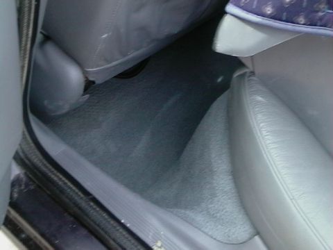 1995 Ford Contour - Interior view of a car's floor and seats, with a watermark at the bottom right.