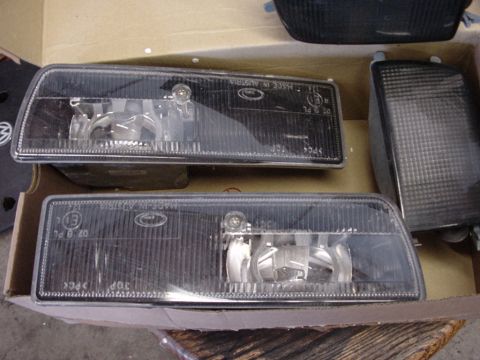 1998 Volkswagen Jetta - Car headlights are shown in a box, with "MADE IN AUSTRIA" visible on one.