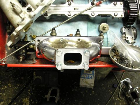 1994 Ford Probe - Close-up of an engine intake manifold, likely during a repair or rebuild process.
