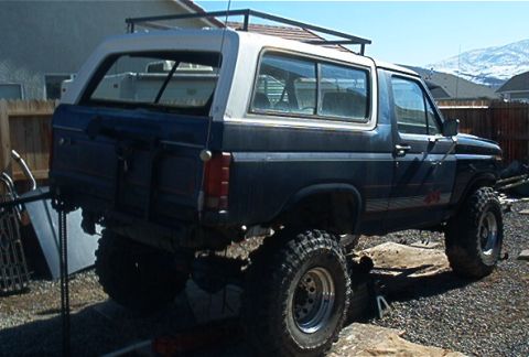 1986 Ford Bronco - This 1986 Ford Bronco is shown with a lifted suspension and a roof rack, ready for off-road adventures.
