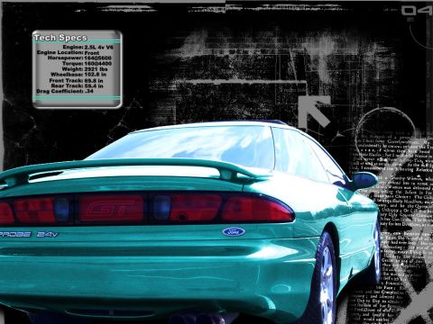 2000 Ford Mustang - The rear of a green Ford Probe GT shows its distinctive taillights and spoiler.