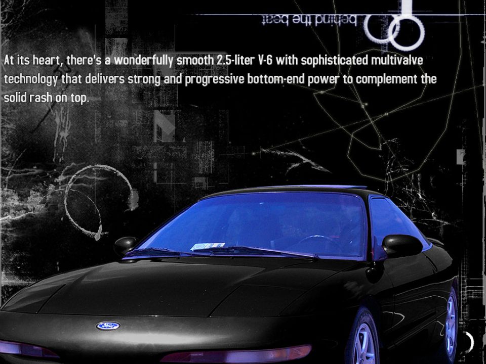 Black coupe front view with blue windshield