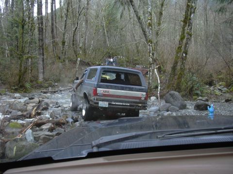 1991 Ford Bronco - This 1991 Ford Bronco navigates a challenging off-road course through a shallow, rocky river.