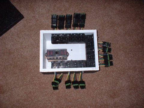 1986 Ford F-250 - Custom fuse box assembly with wiring harness connectors and a 4-fuse block.