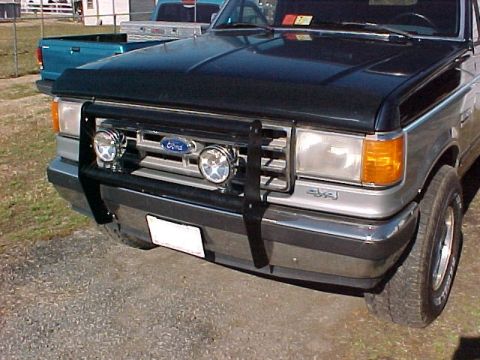 1987 Ford Bronco - Installed a grille guard and two lights.