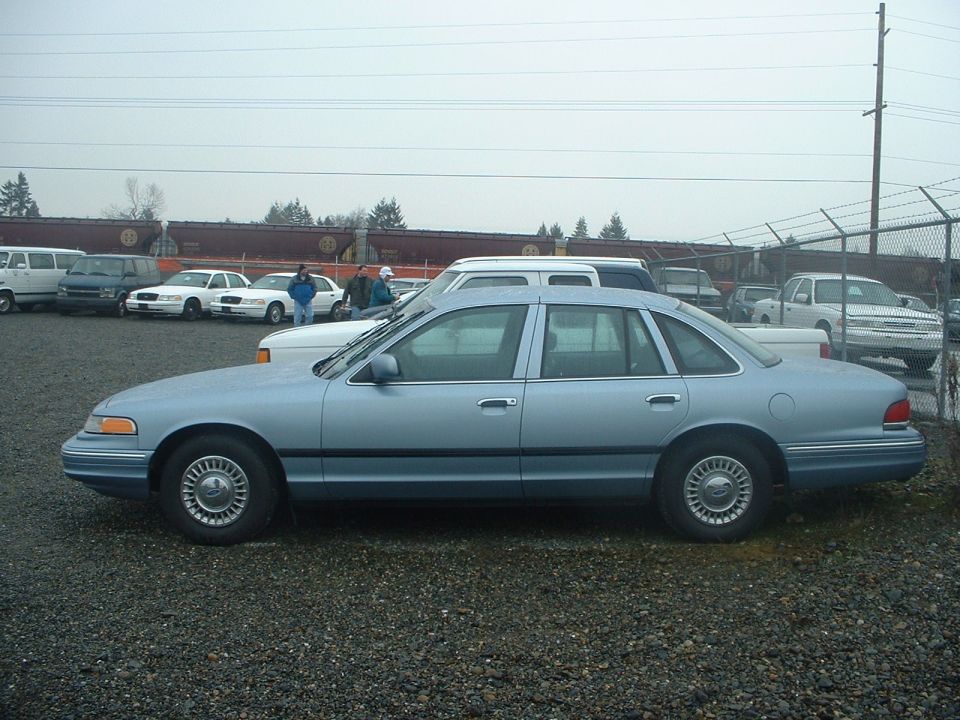 Side view of a 1999 Ford Crown Victoria sedan