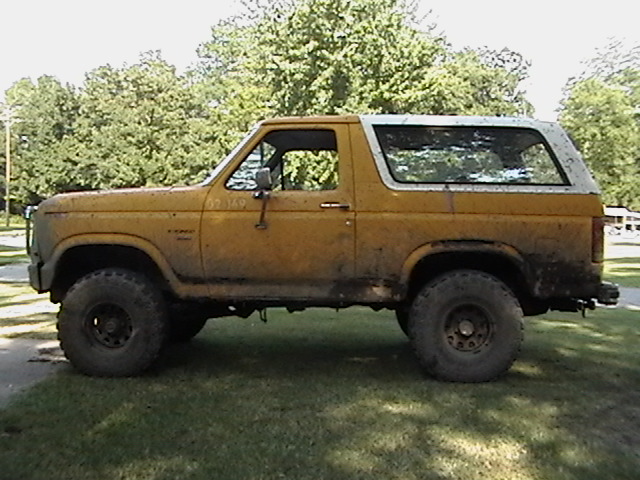 Yellow 1986 Ford Bronco side view