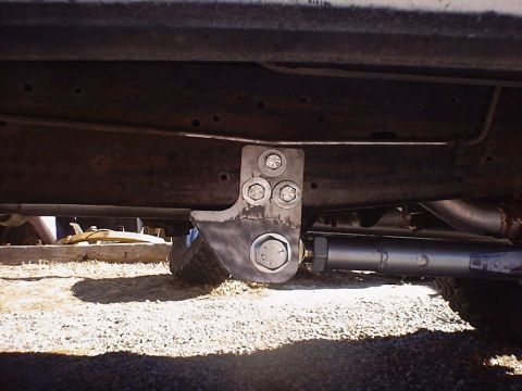 1988 Ford Bronco - This photo shows a custom suspension part, possibly for an off-road vehicle, with 'CAGE' branding visible.