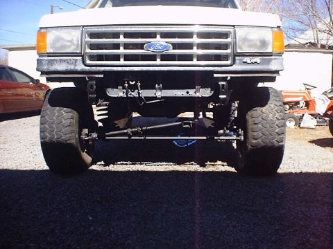 1988 Ford Bronco - Front view of a 1988 Ford Bronco, highlighting its grille and suspension.