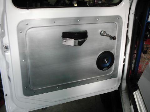 1978 Ford Bronco - Custom aluminum door panel installed in a 1978 Ford Bronco interior.