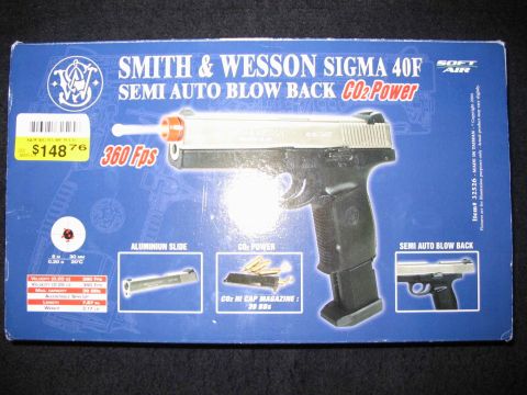 1996 Ford Taurus - Box art for a Smith & Wesson Sigma 40F airsoft pistol, detailing its features and specifications.