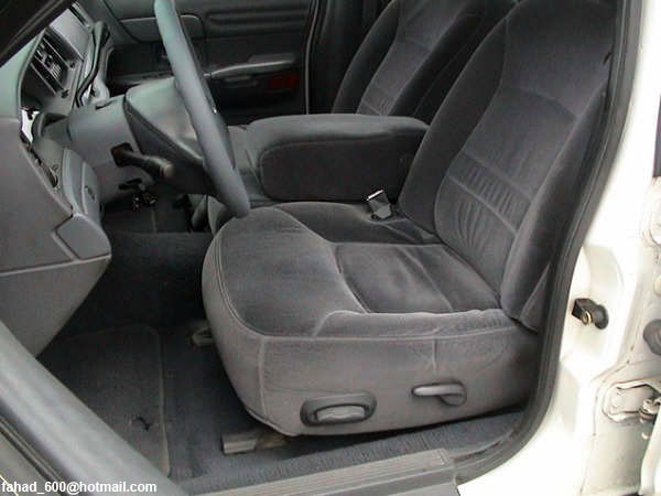1999 Mercury Grand Marquis interior with cloth seats and steering wheel