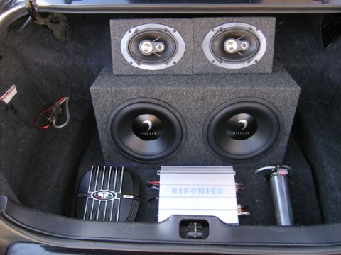 1999 Ford Crown Victoria - 2 12" Diamond Audio, Hifonics 1000x1 @ 1ohm, Rockford 1 Farad custom painted cap, Rockford Fosgate 50x2 for rears, custom box and amp rack