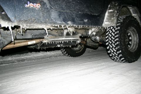 2003 Jeep TJ - Jeep TJ side panel and undercarriage heavily iced over in winter conditions.