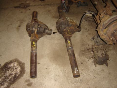 1992 Ford Bronco - Two used differential assemblies are shown on the floor, possibly for a Ford Bronco.