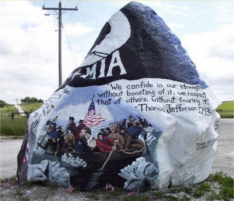 1991 Ford Bronco - This rock features a painting of Washington crossing the Delaware, along with text referencing MIA and a quote from Thomas Jefferson.