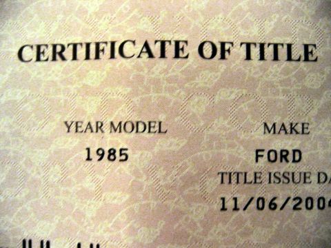 1985 Ford LTD Crown Victoria - Vehicle Certificate of Title document listing year model 1985, make Ford, and title issue date.