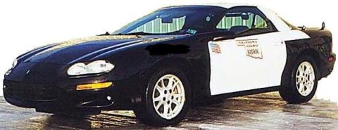 2001 Chevrolet Camaro - This police car, possibly a 2001 Chevrolet Camaro, is marked as belonging to the Oklahoma Highway Patrol.