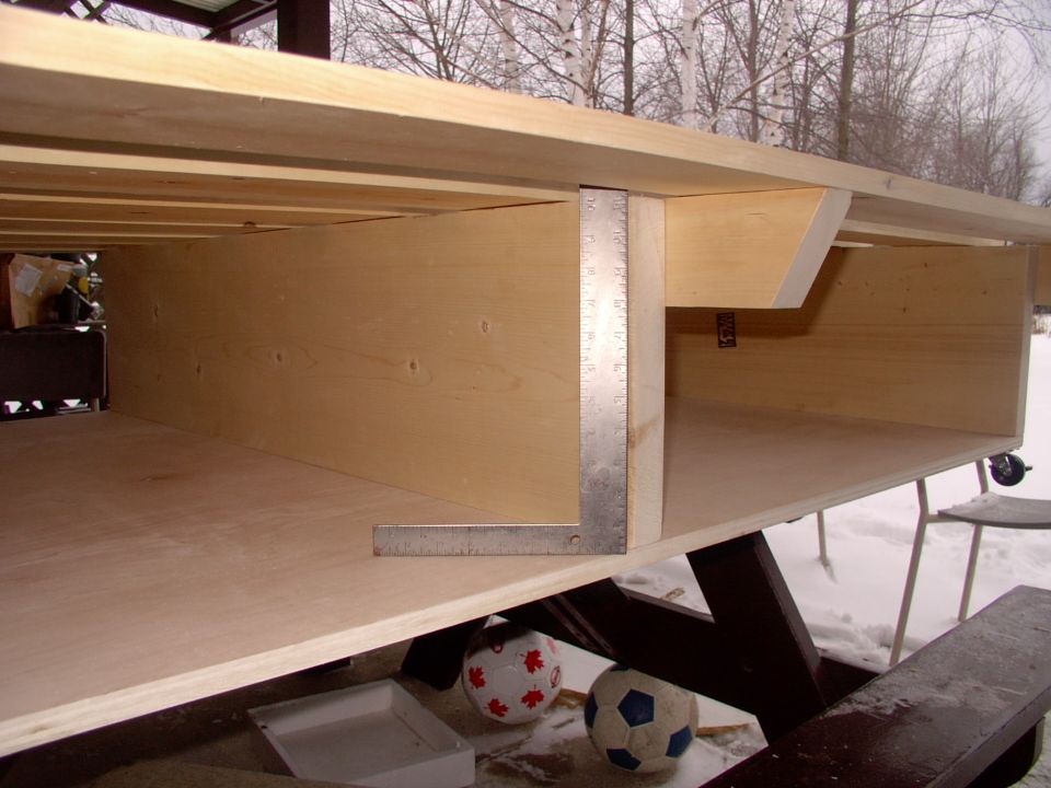 By using 2" X 12"s each compartment yields 12 cubic feet of underbed storage.