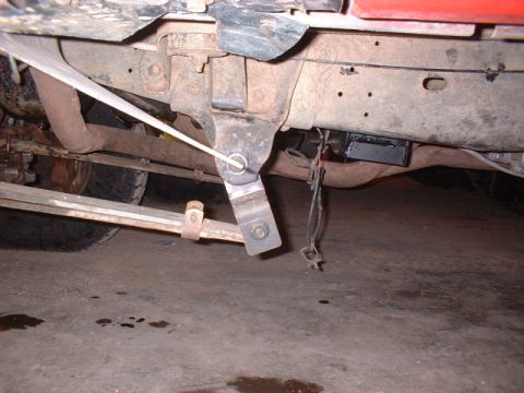 1986 Ford F-250 - Undercarriage view of a truck, showing leaf springs and exhaust system components.