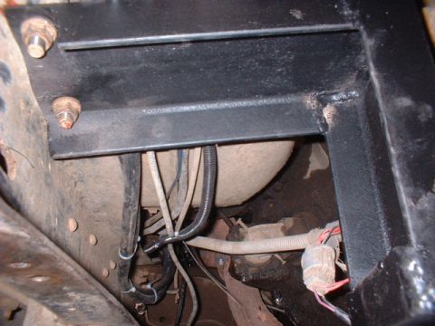 1986 Ford F-250 - Underbody view of vehicle wiring and frame components, not a complete vehicle.