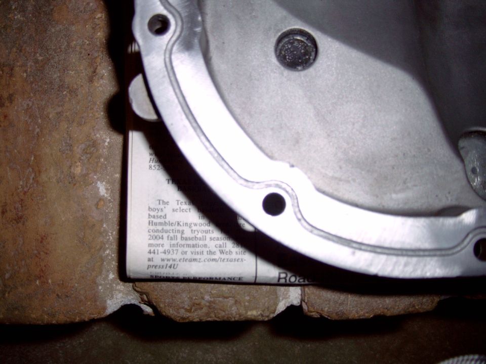 Closeup of magnetic plug and the channel for the sealant.