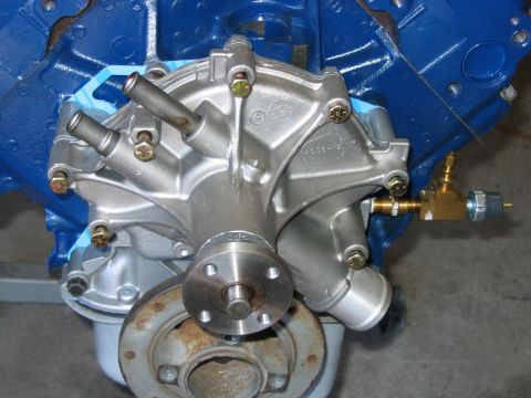 1992 Ford Bronco - water pump on with new hardware. added note: spend the money on a quality water pump, motorcraft preferably.