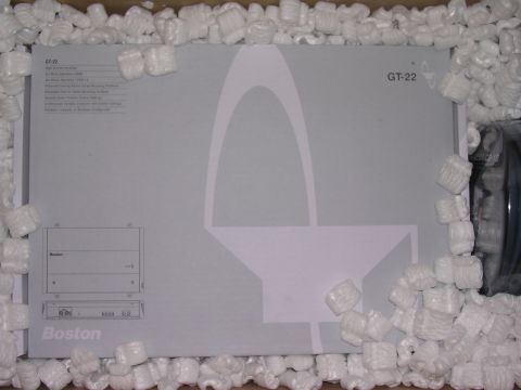 1985 Ford Bronco - A Boston GT-22 amplifier box is shown, surrounded by packing peanuts, with product details printed on its surface.