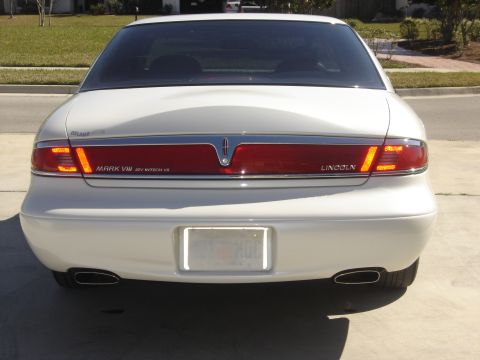 1997 Lincoln Mark VIII - Rear view of a 1997 Lincoln Mark VIII, showing its distinctive taillight bar and badging.