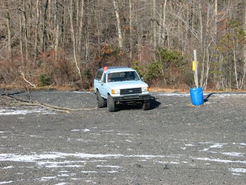 1995 Ford Bronco - This light blue SUV with a camper shell appears to be from the late 1980s, not a 1995 model.
