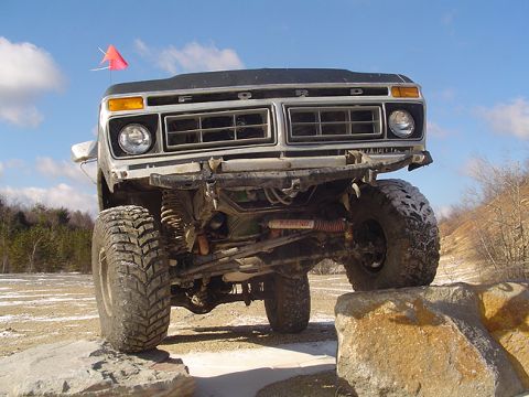 1979 Ford Bronco - This lifted 1978 Ford Bronco navigates a rocky obstacle course, its off-road capabilities.