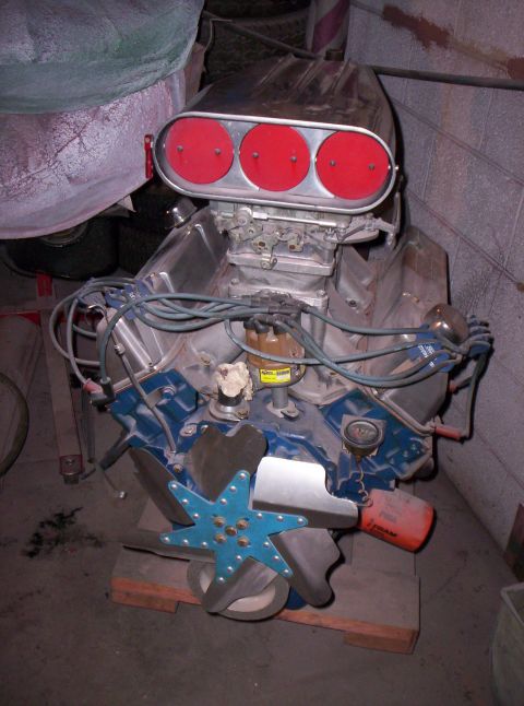 1971 Ford Mustang - This engine features a prominent chrome air cleaner assembly with three red filter elements and blue painted valve covers.
