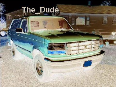 1995 Ford Bronco - This 1995 Ford Bronco is parked in front of a house.